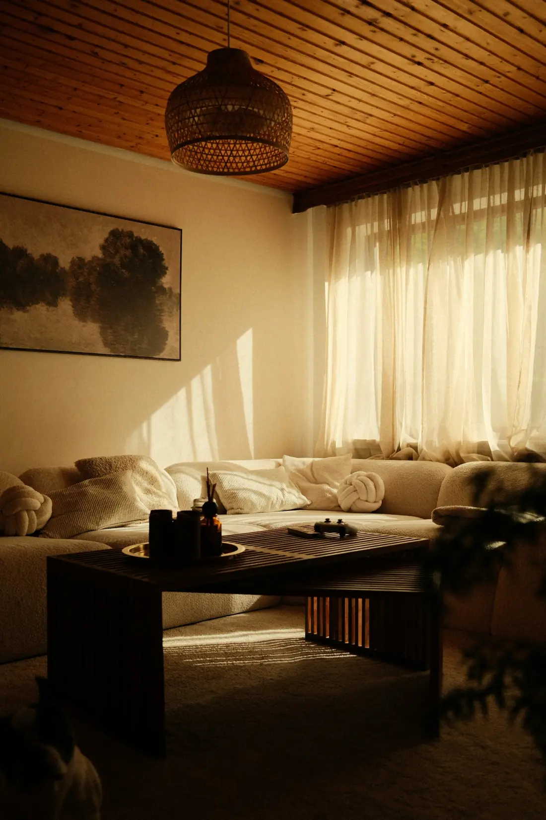 A softly painted living room in warm natural light